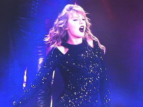 Taylor Swift performs on stage during her Reputation Stadium Tour at the Rogers Centre in Toronto on Aug. 3, 2018.