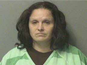 This undated photo provided by the Polk County Jail in Iowa, shows Jessica Henderson, who is accused of binding her children by the hands or feet to keep them under control. Polk County court records said Henderson is charged with child endangerment.