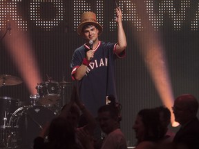 Jeremy Dutcher accepts the 2018 Polaris Music Prize for his album Wolastoqiyik Lintuwakonawa during the Polaris Music Prize gala in Toronto on Monday, September 17, 2018.