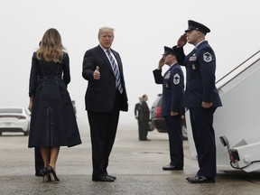 President Donald Trump and first lady Melania Trump board Air Force One to attend the September 11th Flight 93 Memorial Service in Shanksville, Pa., Tuesday, Sept. 11, 2018 in Andrews Air Force Base, Md.
