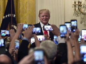 President Donald Trump arrives to speak during a Hispanic Heritage Month Celebration in the East Room of the White House in Washington, Monday, Sept. 17, 2018.