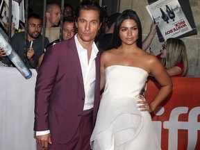 Matthew McConaughey with his wife Camila Alves McConaughey walks the red carpet before attending the movie "White Boy Rick"  during the Toronto International Film Festival in Toronto on Sept. 7, 2018. (Veronica Henri/Toronto Sun/Postmedia Network)