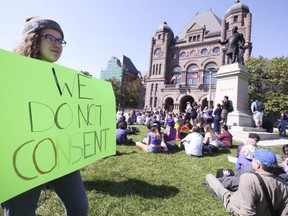 More than 100 students, parents and supporters sat on the front lawn of the Ontario Legislature on Saturday to tell the Ford government they want the new sex-ed curriculum brought back.