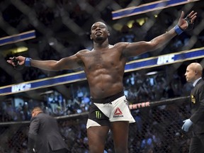 Jon Jones reacts after knocking out Daniel Cormier during UFC 214 in Anaheim, Calif., Saturday July, 29, 2017.