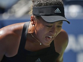 Naomi Osaka reacts after winning a point against Lesia Tsurenko during the quarterfinals of the U.S. Open, Wednesday, Sept. 5, 2018, in New York.