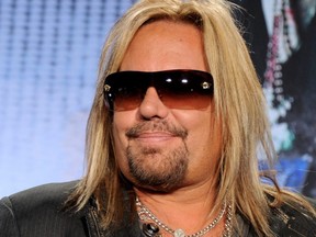 Motley Crue singer Vince Neil says the band is planning to record new music.