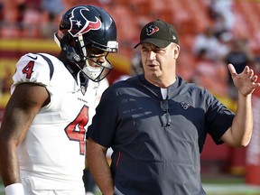 In this Aug. 9, 2018, file photo, Houston Texans quarterback Deshaun Watson (4) listens to head coach Bill O'Brien before a preseason game against the Kansas City Chiefs in Kansas City, Mo. (AP Photo/Ed Zurga, File)