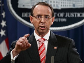 In this July 13, 2018, file photo, U.S. Deputy Attorney General Rod Rosenstein speaks during a news conference at the Department of Justice in Washington.