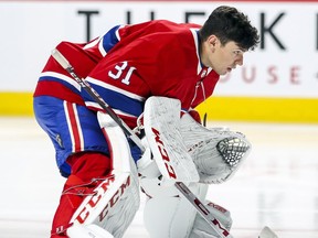 Canadiens Carey Price glides to his net after the national anthem before NHL game against the Toronto Maple Leafs at the Bell Centre in Montreal on Sept. 26, 2018.
