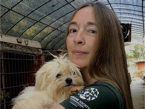 "Here, the healing really begins," said Rebecca Aldworth, of HSI/Canada, holding one of the rescued dogs.