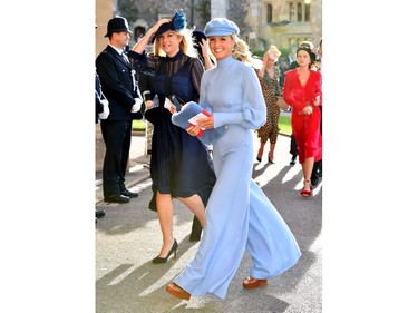 WINDSOR, ENGLAND - OCTOBER 12: Chelsy Davy (L) arrives ahead of the wedding of Princess Eugenie of York to Jack Brooksbank at Windsor Castle on October 12, 2018 in Windsor, England.