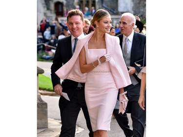 WINDSOR, ENGLAND - OCTOBER 12: Nick Candy and Holly Candy arrive ahead of the wedding of Princess Eugenie of York to Jack Brooksbank at Windsor Castle on October 12, 2018 in Windsor, England.