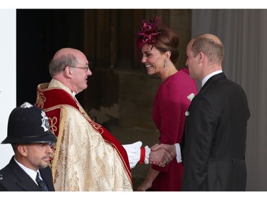 WINDSOR, ENGLAND - OCTOBER 12: Catherine, Duchess of Cambridge and Prince William, Duke of Cambridge shakes hands The Rt Revd David Conner, Dean of Windsor             with arrive ahead of the wedding of Princess Eugenie of York and Mr. Jack Brooksbank at St. George's Chapel on October 12, 2018 in Windsor, England.