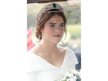 WINDSOR, ENGLAND - OCTOBER 12:  The bride Princess Eugenie of York arrives by car for her Royal wedding to Mr. Jack Brooksbank at St. George's Chapel on October 12, 2018 in Windsor, England.