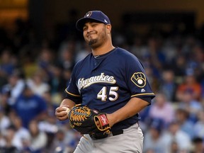 Jhoulys Chacin of the Milwaukee Brewers reacts during Game 3 of the National League Championship Series at Dodger Stadium on October 15, 2018 in Los Angeles.
