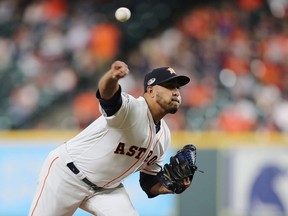 Hector Rondon #30 of the Houston Astros pitches in the ninth inning against the Boston Red Sox during Game Three of the American League Championship Series at Minute Maid Park on October 16, 2018 in Houston, Texas.