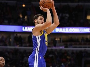 Klay Thompson of the Golden State Warriors puts up a three point shot on his way to a game-high 52 points against the Chicago Bulls at the United Center on October 29, 2018 in Chicago, Illinois.