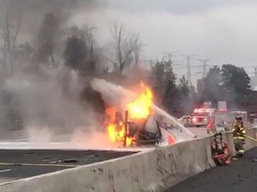 Emergency crews attend a fire after an accident on highway 407, as shown in this still image taken from a video provided by Ontario Provincial Police Sgt. Kerry Schmidt, in Toronto on Wednesday Oct. 31, 2018.