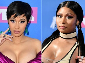 (COMBO) This combination of file pictures created on September 8, 2018 shows rapper Cardi B (L) at the 2018 MTV Video Music Awards at Radio City Music Hall on August 20, 2018 in New York; and rapper Nicki Minaj at the 2018 MTV Video Music Awards at Radio City Music Hall in New York.  (Photos by ANGELA WEISS / AFP)ANGELA WEISS/AFP/Getty Images