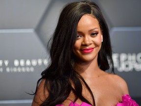 In this file photo taken on Sept. 14, 2018, Rihanna attends the Fenty Beauty by Rihanna event at Sephora in Brooklyn, New York. (ANGELA WEISS/AFP/Getty Images)