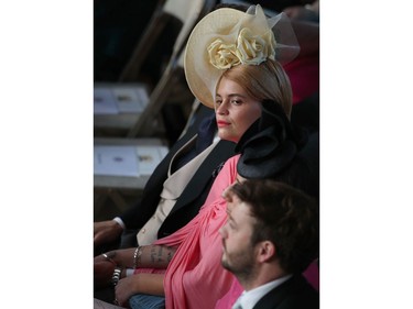 Pixie Geldof sits takes her seat inside St George's Chapel ahead of the wedding of Britain's Princess Eugenie of York to Jack Brooksbank at Windsor Castle, in Windsor, on October 12, 2018.