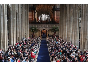 Guests take thier seats inside St George's Chapel ahead of the wedding of Britain's Princess Eugenie of York to Jack Brooksbank at Windsor Castle, in Windsor, on October 12, 2018.