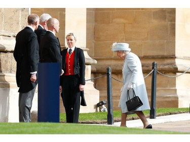 Britain's Queen Elizabeth II arrives to attend the wedding of Britain's Princess Eugenie of York to Jack Brooksbank at St George's Chapel, Windsor Castle, in Windsor, on October 12, 2018.