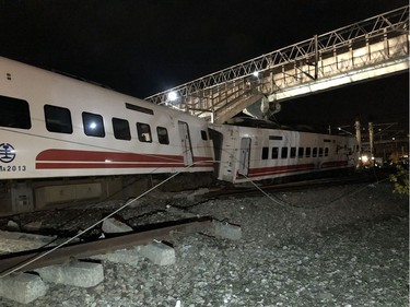 This handout photo made available by the Taiwan Railway Administration on Oct. 21 2018, shows the scene after the Puyuma Express train derailed near Xinma station in Taiwan's northeastern Yilan county.