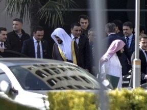 Saudi Arabia's top prosecutor Saud al-Mojeb, centre left, leaves his hotel to go to his country's consulate in Istanbul, Tuesday, Oct. 30, 2018.