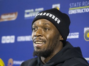 FILE - In this Aug. 21, 2018, file photo, Jamaica's Usain Bolt speaks at his press conference with the Central Coast Mariners soccer team in Newcastle, Australia. Bolt says his performance in a trial match could determine his future with the Central Coast Mariners in the A-League and his attempt to play professional football in general.