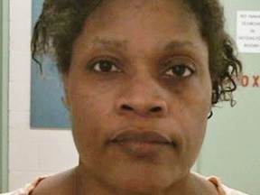 This photo provided by the Bolivar County Sheriff's Office shows Carolyn Jones, 48, who was taken into custody in Mississippi, Tuesday, Oct. 16, 2018. A sheriff says Jones has been charged with first-degree murder after her 20-month-old granddaughter, Royalty Marie Floyd, was found stabbed and burned inside an oven. Authorities have confirmed that the child was living at the residence with Jones at the time of the murder. (Bolivar County Sheriff's Office via the AP) ORG XMIT: MSRS103