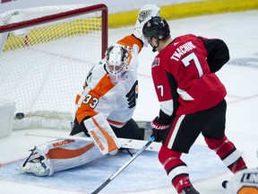 Senators' Brady Tkachuk scores on Philadelphia Flyers goaltender Calvin Pickard during first-period ction Wednesday, Oct. 10, 2018 in Ottawa. (THE CANADIAN PRESS)