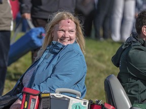 A spectator who was hit with Tyrell Hatton's tee shot at the 15th hole is taken by buggy back to the medical centre for treatment during day one at Kingsbarns Golf Course, St Andrews, Scotland, Thursday, Oct. 4, 2018.