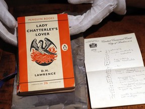 In this Friday, Oct. 26, 2018 file photo, a copy of D.H Lawrence's book "Lady Chatterley's Lover" that was the judge's personal version used in the infamous 1960 Chatterley trial, on view in Sotheby's auction house in London.