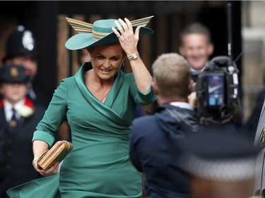 Sarah Ferguson, mother of Britain's Princess Eugenie of York, arrives to attend the wedding of Princess Eugenie of York and Jack Brooksbank at St George's Chapel, Windsor Castle, near London, England, Friday Oct. 12, 2018. (Adrian Dennis/Pool via AP) ORG XMIT: RWW329
