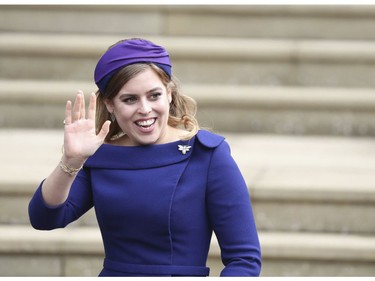 Princess Beatrice arrives for the wedding of Princess Eugenie of York and Jack Brooksbank at St George's Chapel, Windsor Castle, near London, England, Friday Oct. 12, 2018. (Steve Parsons/Pool via AP) ORG XMIT: RWW136