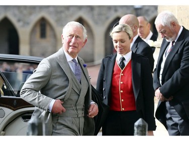 Britain's Prince Charles arrives ahead of the wedding of Princess Eugenie of York and Jack Brooksbank at St George's Chapel, Windsor Castle, near London, England, Friday Oct. 12, 2018. (Gareth Fuller/Pool via AP) ORG XMIT: RWW357