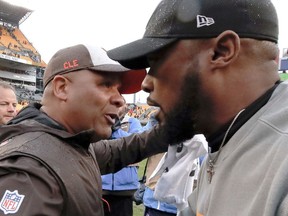 Pittsburgh Steelers head coach Mike Tomlin, right, greets Cleveland Browns head coach Hue Jackson after an NFL football game against the Cleveland Browns, Sunday, Oct. 28, 2018, in Pittsburgh. The Steelers won 33-18.