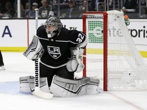 Los Angeles Kings goaltender Jonathan Quick gives up a goal on a shot from San Jose Sharks' Evander Kane during the first period of an NHL hockey game Friday, Oct. 5, 2018, in Los Angeles. (AP Photo/Marcio Jose Sanchez)