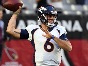 Broncos quarterback Chad Kelly warms up before a game against the Cardinals at State Farm Stadium in Glendale, Arizona, on Thursday, Oct. 18, 2018.