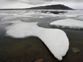 Ice floats in Slidre Fjord outside the Eureka Weather Station on Ellesmere Island, Nunavut, July 24, 2006.