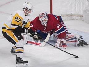 Pittsburgh Penguins star Sidney Crosby is stopped by Montreal Canadiens goaltender Antti Niemi during a shootout in Montreal, Saturday, October 13, 2018. (THE CANADIAN PRESS/Graham Hughes)