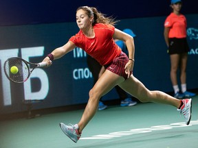 Daria Kasatkina of Russia returns a shot during the final match of the Kremlin Cup tennis tournament against Ons Jabeur of Tunisia in Moscow, Russia, Saturday, Oct. 20, 2018.