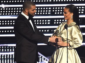 Drake presents Rihanna with the The Video Vanguard Award during the 2016 MTV Video Music Awards at Madison Square Garden on August 28, 2016 in New York City. (Michael Loccisano/Getty Images)