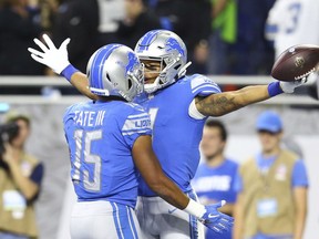 Detroit Lions wide receiver Marvin Jones, right celebrates his touchdown with teammate Golden Tate (15) against the Seattle Seahawks, Sunday, Oct. 28, 2018, in Detroit.