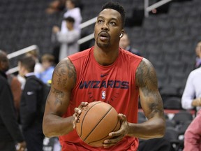 Wizards centre Dwight Howard shoots around before a game against the Heat, Thursday, Oct. 18, 2018, in Washington.