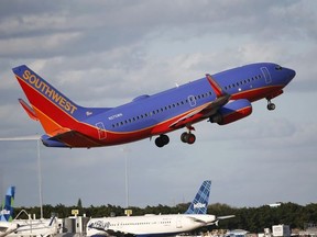 FILE - In this Friday, Feb. 10, 2017, file photo, a Southwest Airlines plane takes off from Palm Beach International Airport in West Palm Beach, Fla.