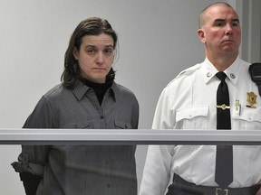 In this Jan. 22, 2013, file photo, Sonja Farak, left, stands during her arraignment at Eastern Hampshire District Court in Belchertown, Mass. (Don Treeger/The Republican via AP, Pool, File)