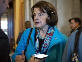 Sen. Dianne Feinstein talks to reporters as she exits the Senate floor October 6, 2018 in Washington, DC. (Drew Angerer/Getty Images)