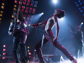 This image released by Twentieth Century Fox shows Gwilym Lee, from left, Rami Malek and Joe Mazzello in a scene from "Bohemian Rhapsody."